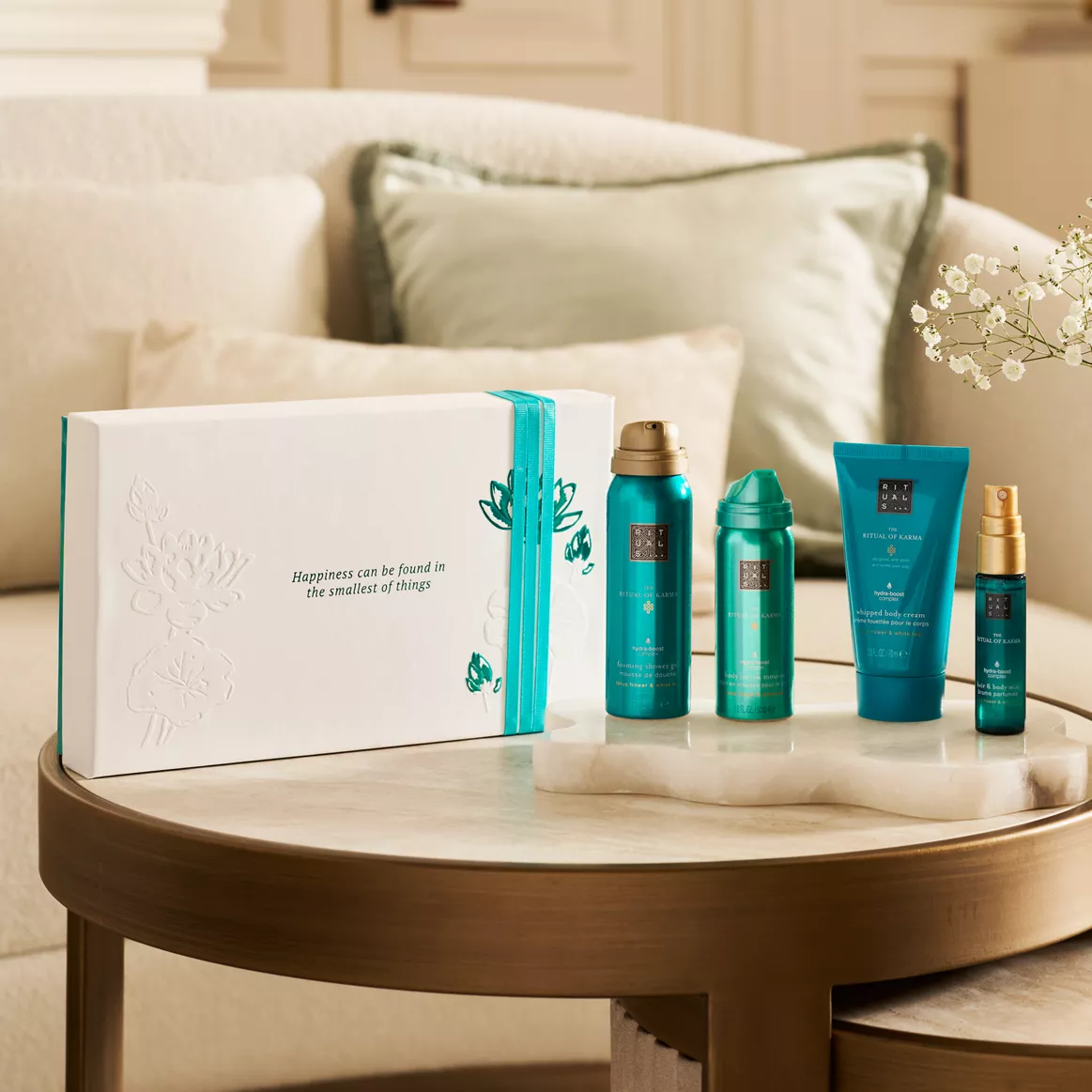 Rituals coffret ritual of karma taille S (mousse de douche 50ml, huile de douche 75ml, spray cheveux&sorps 20ml, crème corporelle 70ml - Parfum et cosmétiques authentiques en vente chez Choupinette para & parfumerie